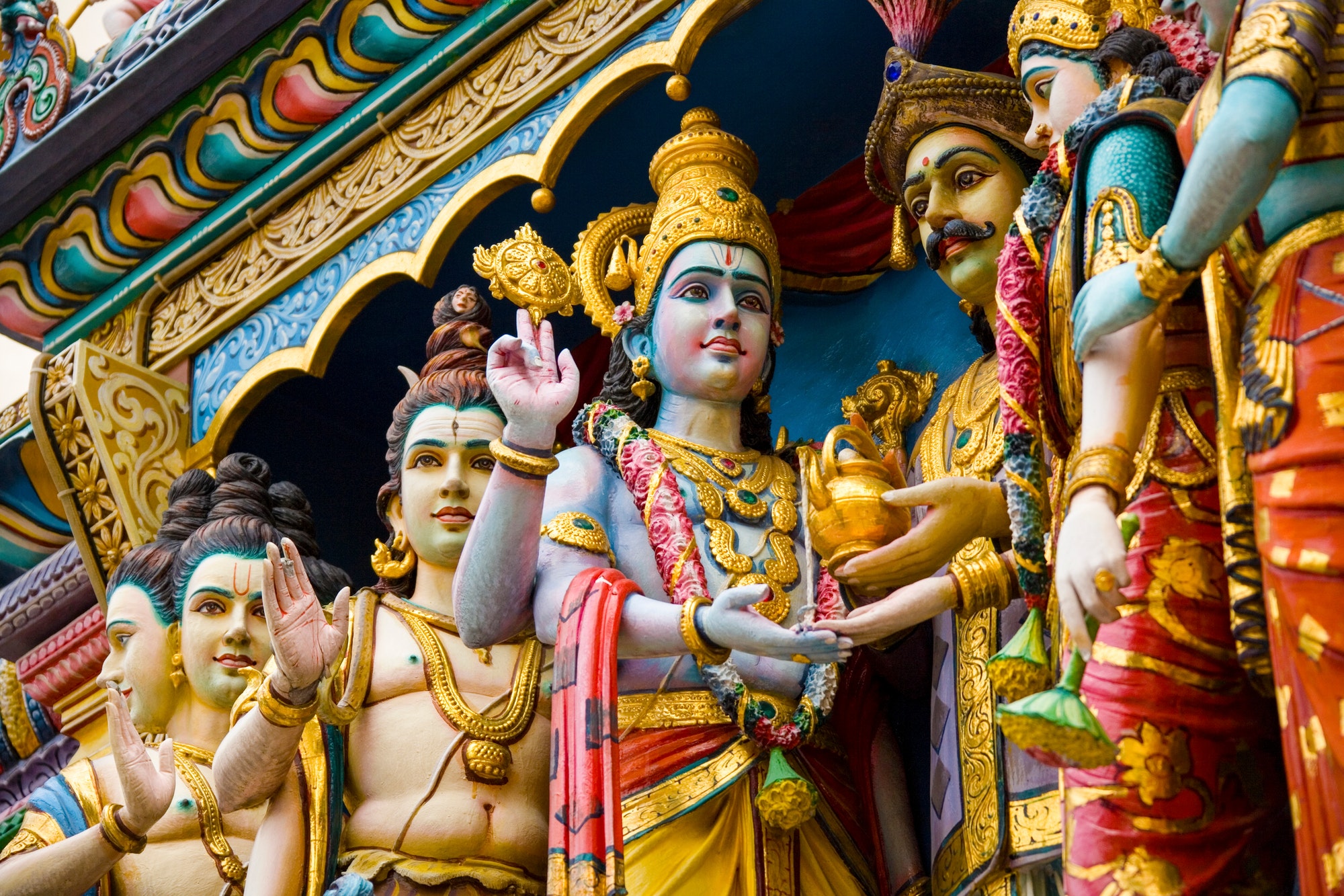 Colorful statues of Hindu gods on the exterior of the Sri Krishnan Hindu Temple in the city of